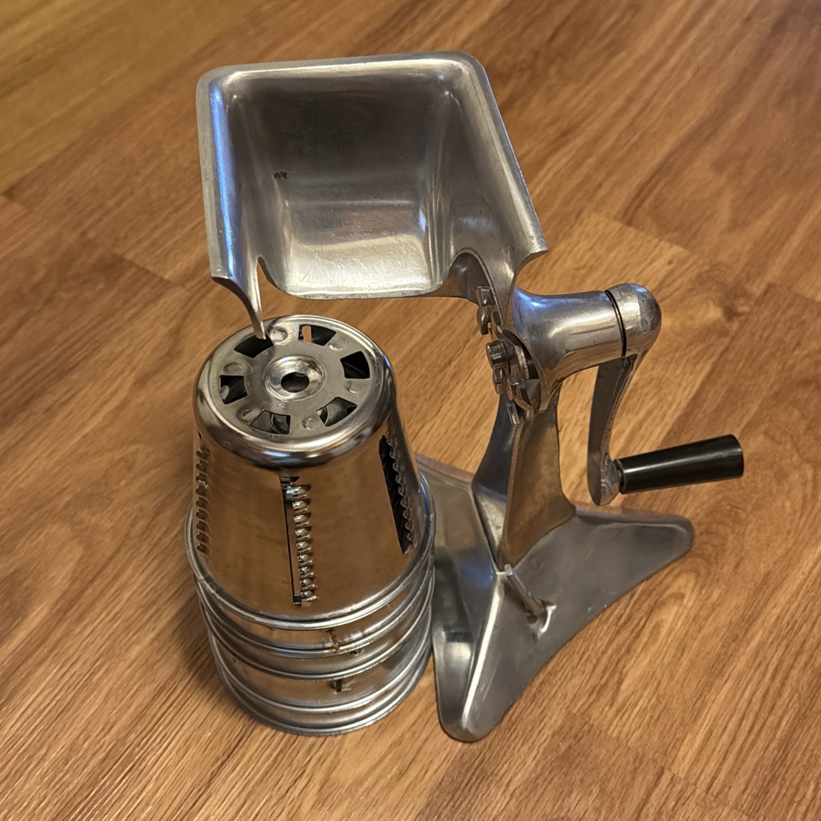 Vintage Kitchen-Quip, Inc. Manual Food Processor with 5 Cones And Suction Base